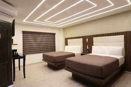 Double Room | Desk, iron/ironing board, free WiFi. Hotel Bugambilias