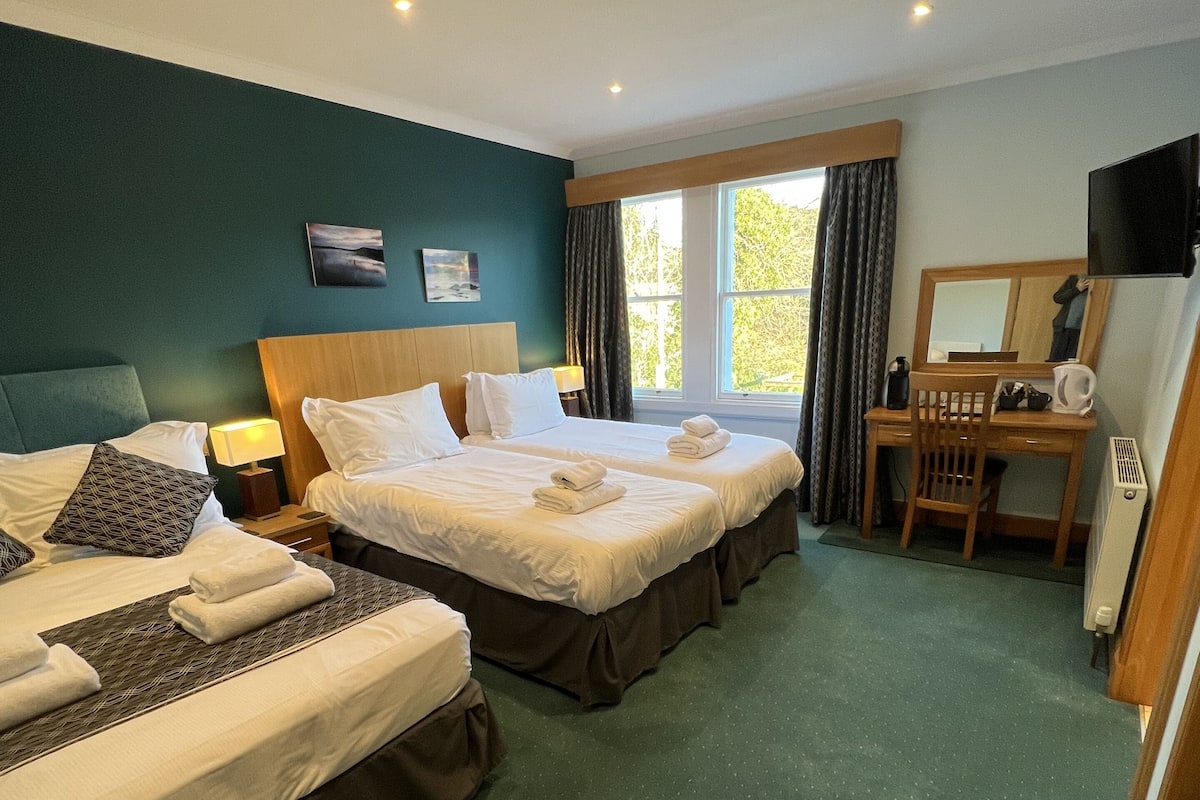 Family Room | Premium bedding, memory foam beds, individually decorated