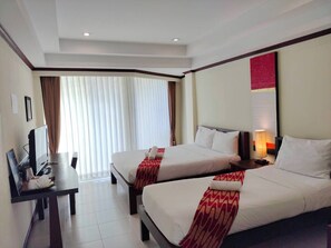 Family Room | Hypo-allergenic bedding, minibar, in-room safe, individually decorated
