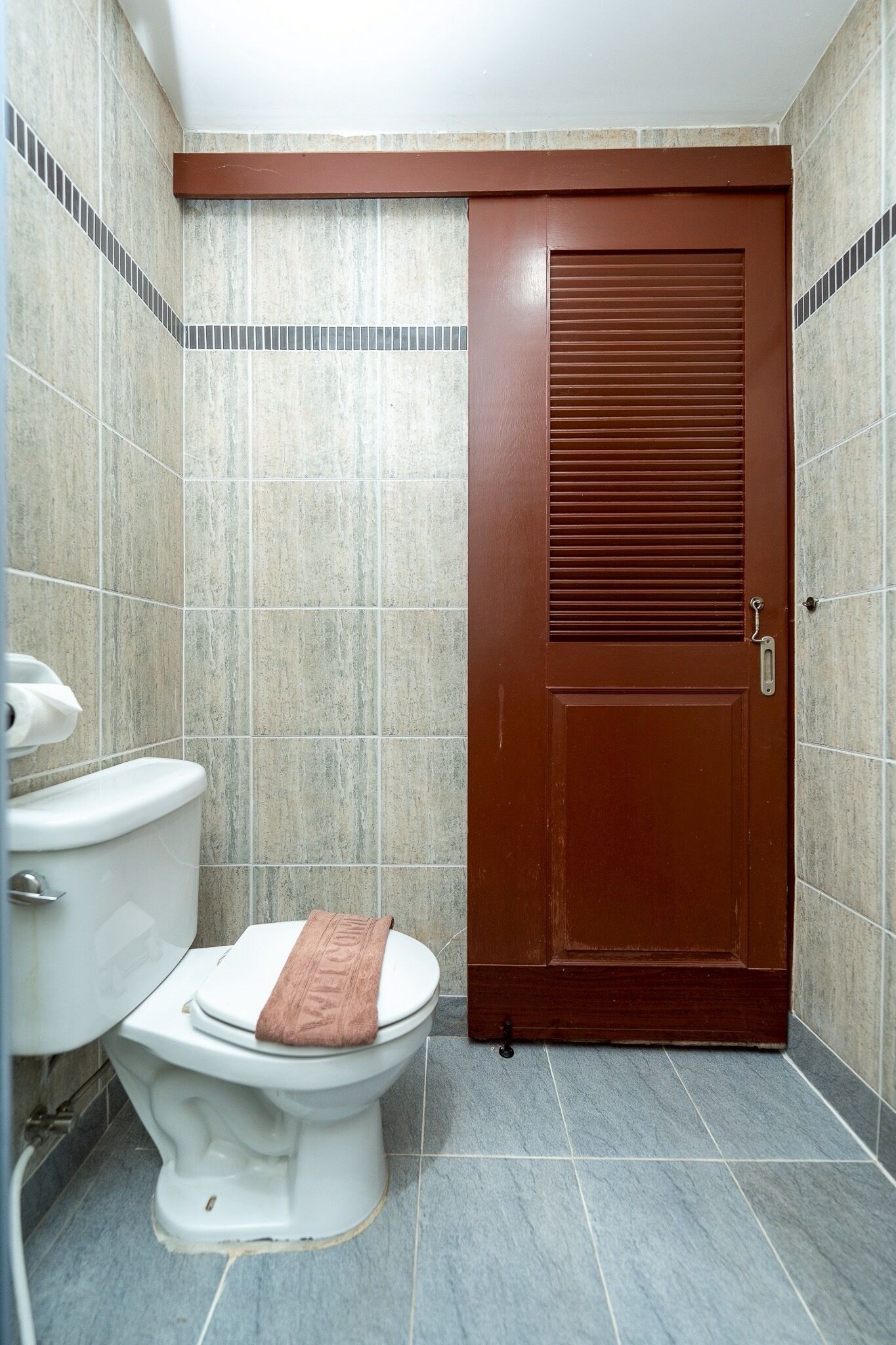 family room | bathroom | rainfall showerhead, free toiletries, hair dryer, slippers