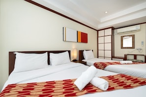 Family Room | Hypo-allergenic bedding, minibar, in-room safe, individually decorated