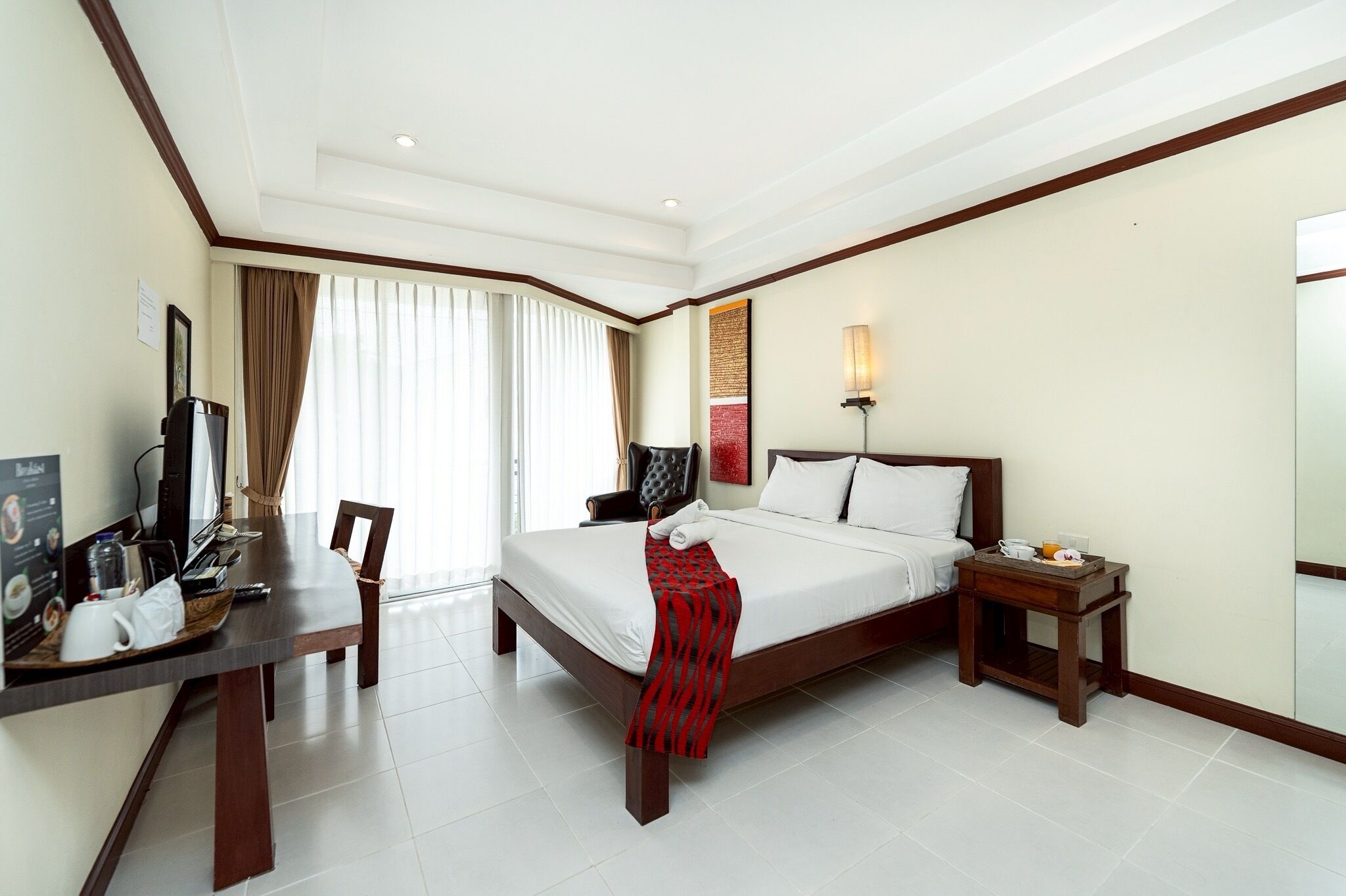 deluxe room | hypo-allergenic bedding, minibar, in-room safe, individually decorated