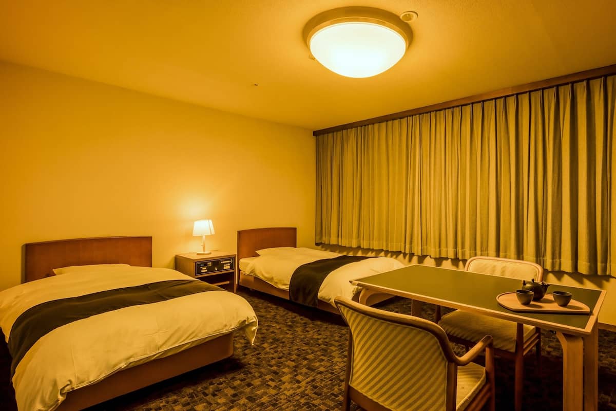 Standard Western Style Twin Room with Bath (No View), Non-Smoking | 1 bedroom, in-room safe, desk, iron/ironing board