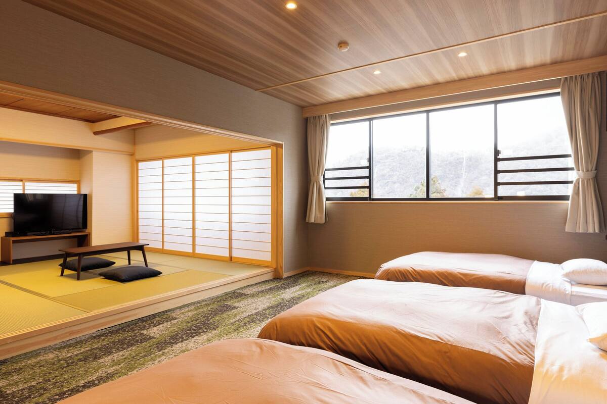 superior japanese-western-style triple room - indoor bath - non-smoking | in-room safe, desk, free wifi, bed sheets