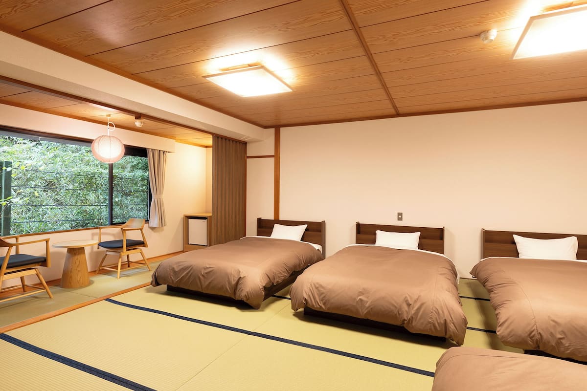 standard japanese style 4-pax room with bath,non-smoking | in-room safe, desk, free wifi, bed sheets