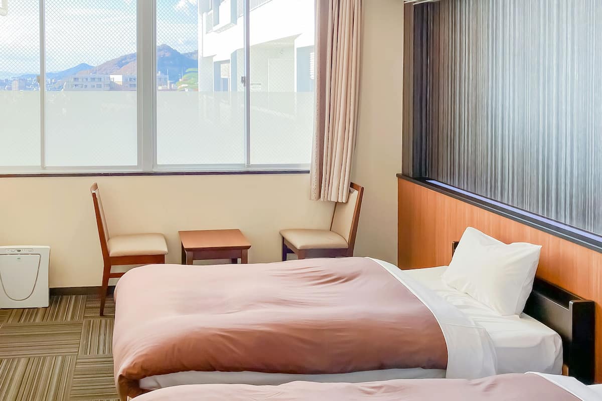 Chambre Ăconomique avec lits jumeaux, non-fumeurs (Western Style, without Bath) | 1 chambre, coffres-forts dans les chambres, bureau, Wi-Fi gratuit