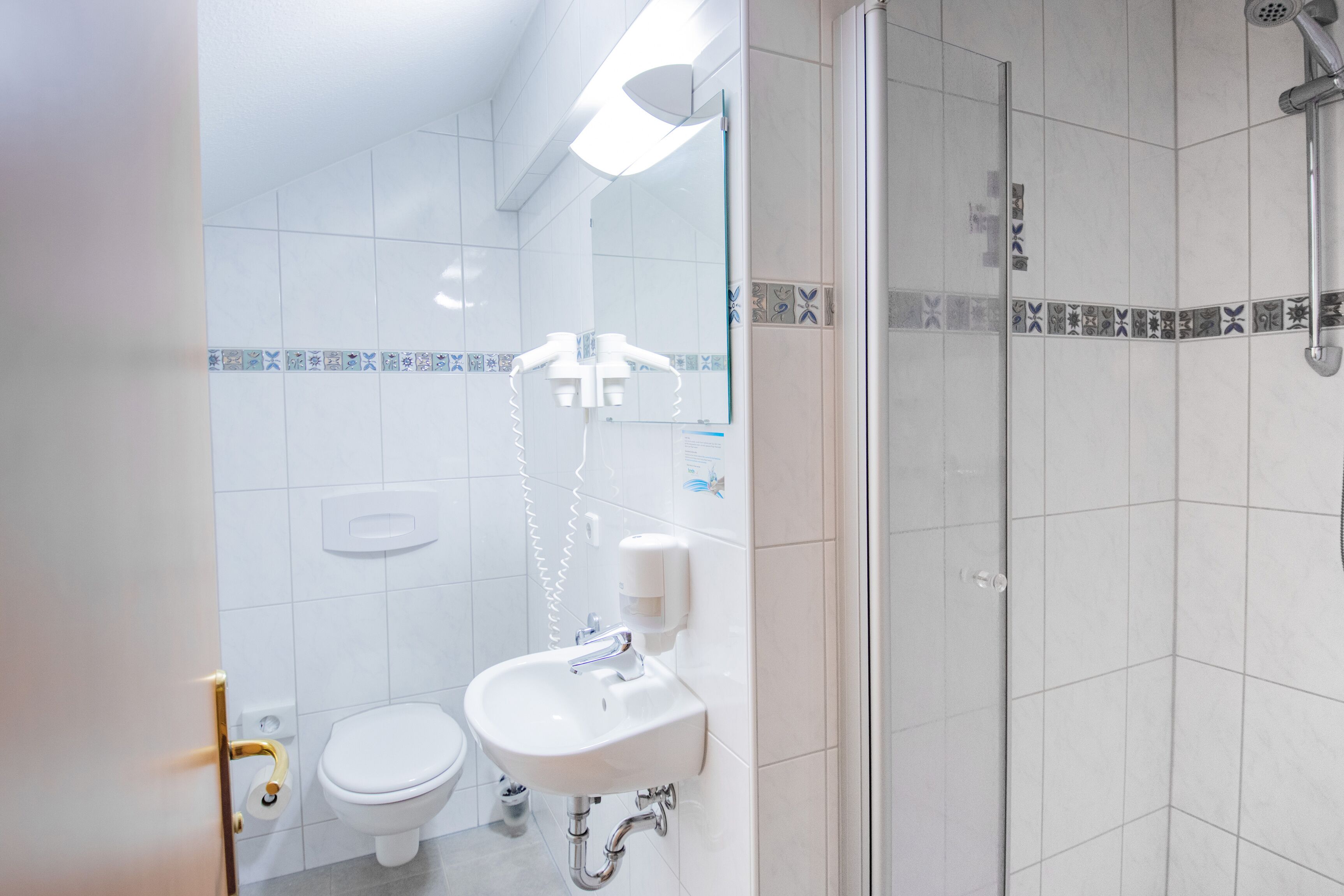 junior suite | bathroom | shower, rainfall showerhead, free toiletries, hair dryer