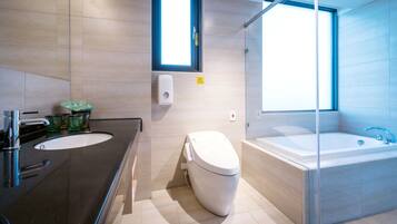 Executive Suite, 2 Double Beds | Bathroom | Shower, free toiletries, hair dryer, slippers