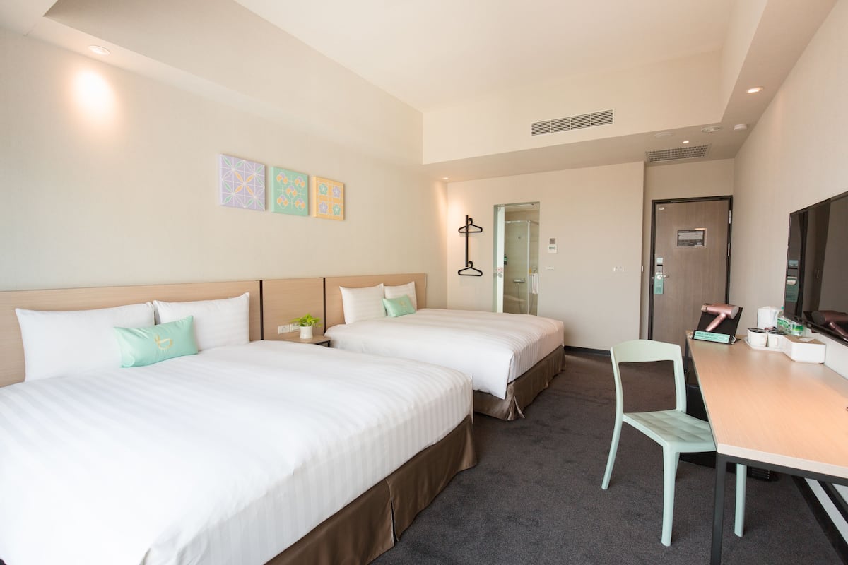 Deluxe Quadruple Room | Premium bedding, desk, soundproofing, free WiFi