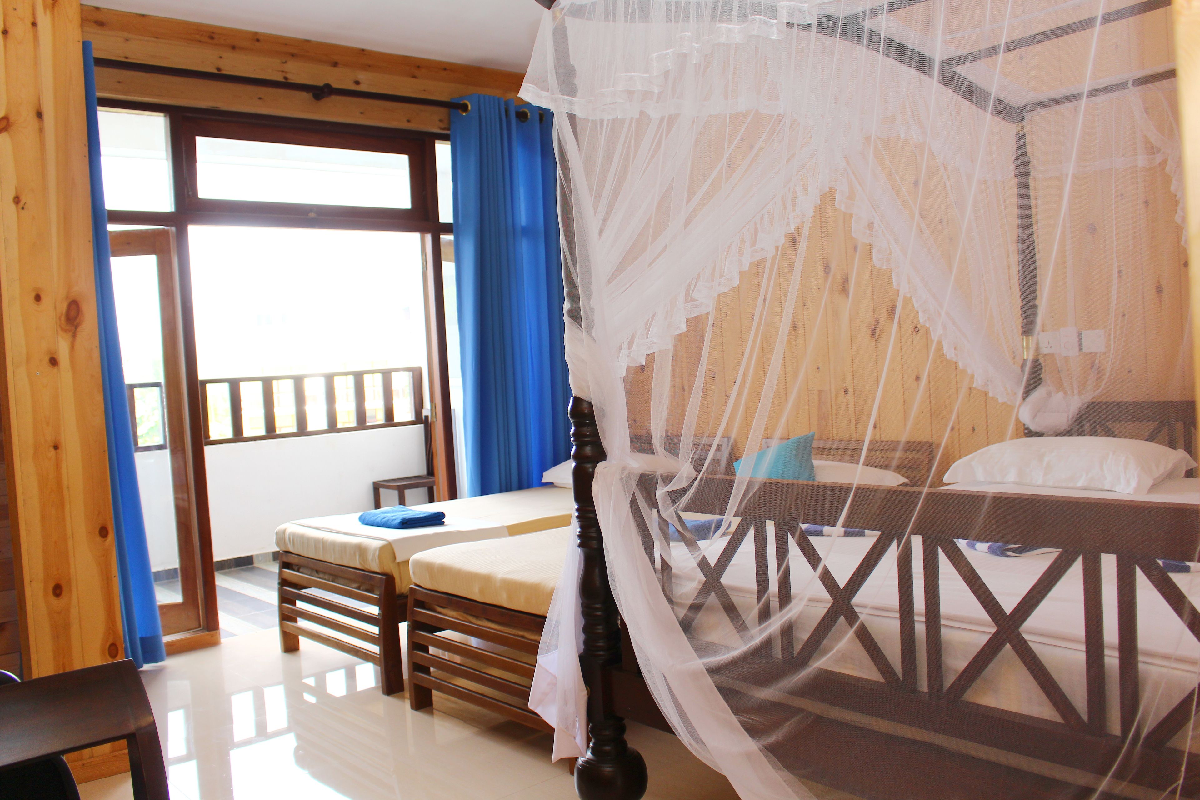 superior quadruple room, balcony, garden view | 1 bedroom, egyptian cotton sheets, premium bedding, minibar