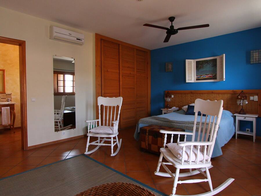 Suite, Balcony (Cabo Verde) | Minibar, in-room safe, desk, blackout drapes