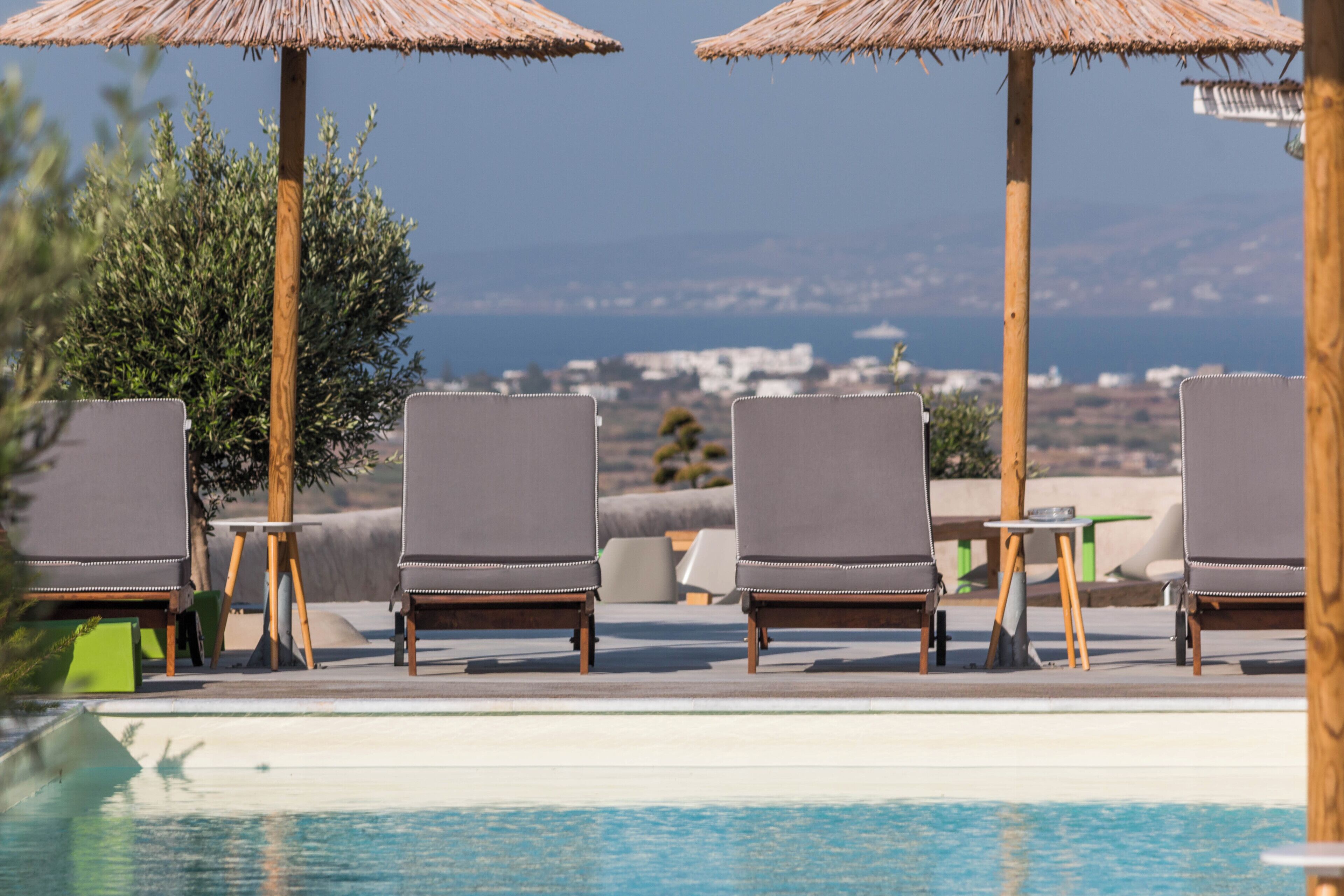 Outdoor pool, pool umbrellas, sun loungers