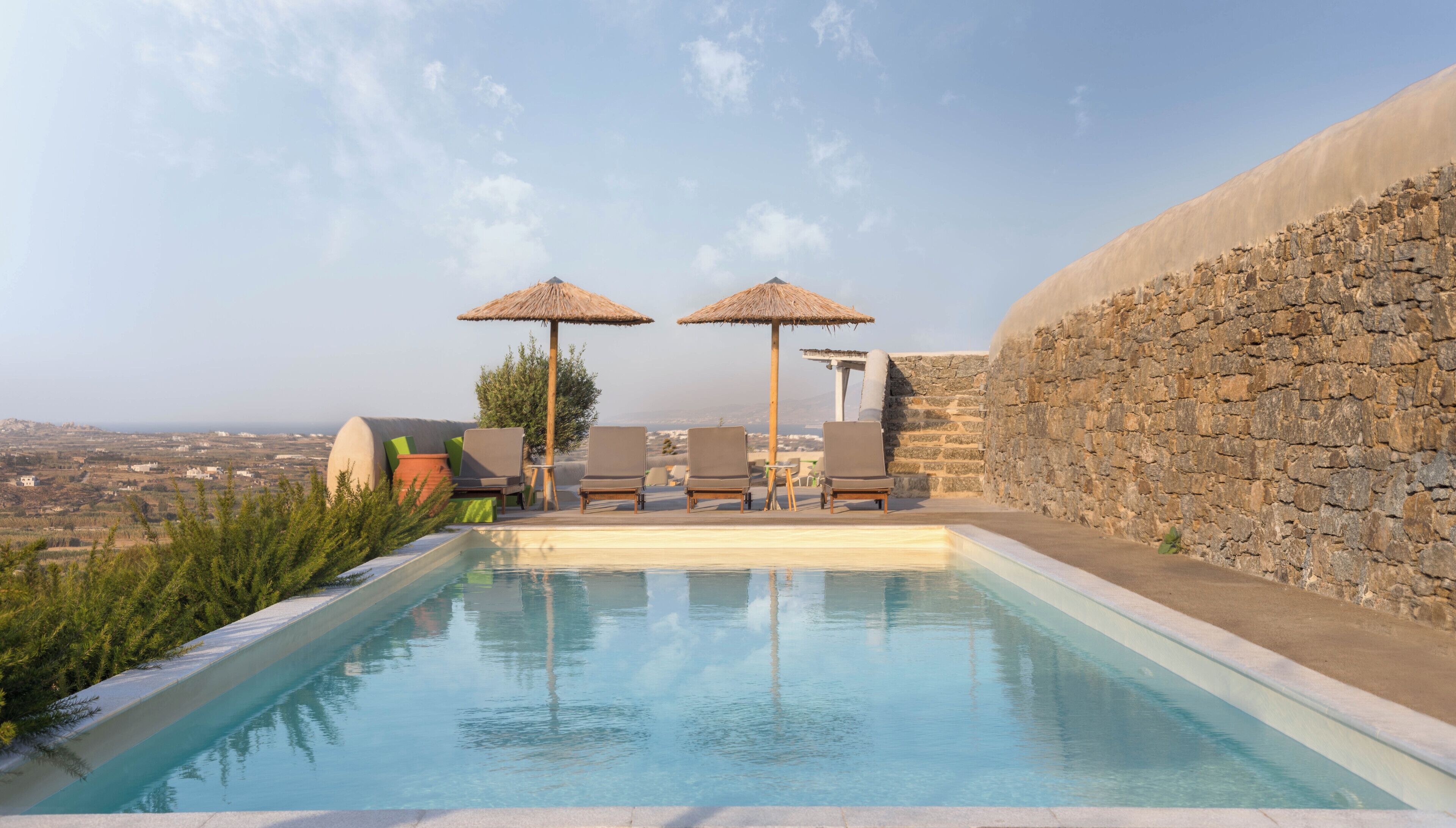 Outdoor pool, pool umbrellas, sun loungers