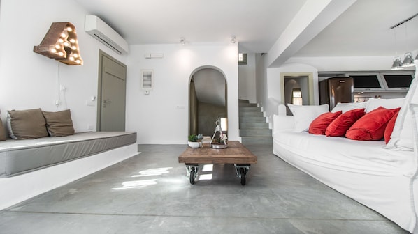 Villa (Panoramic View) | Living room | 42-inch LCD TV with satellite channels, TV, DVD player - Halcyon Suites and Villas Naxos (Naxos)