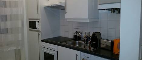 Business Apartment, 1 Bedroom, Kitchen, Courtyard View (excluded 35 EUR Cleaning Fee per stay) | Private kitchen | Fridge, microwave, oven, stovetop