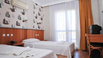 Economy Room | Minibar, in-room safe, free WiFi