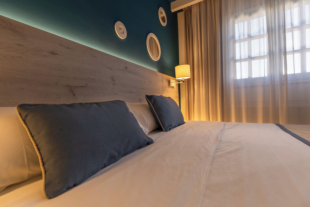 Blackout drapes, cribs (free), WiFi (surcharge), bed sheets
