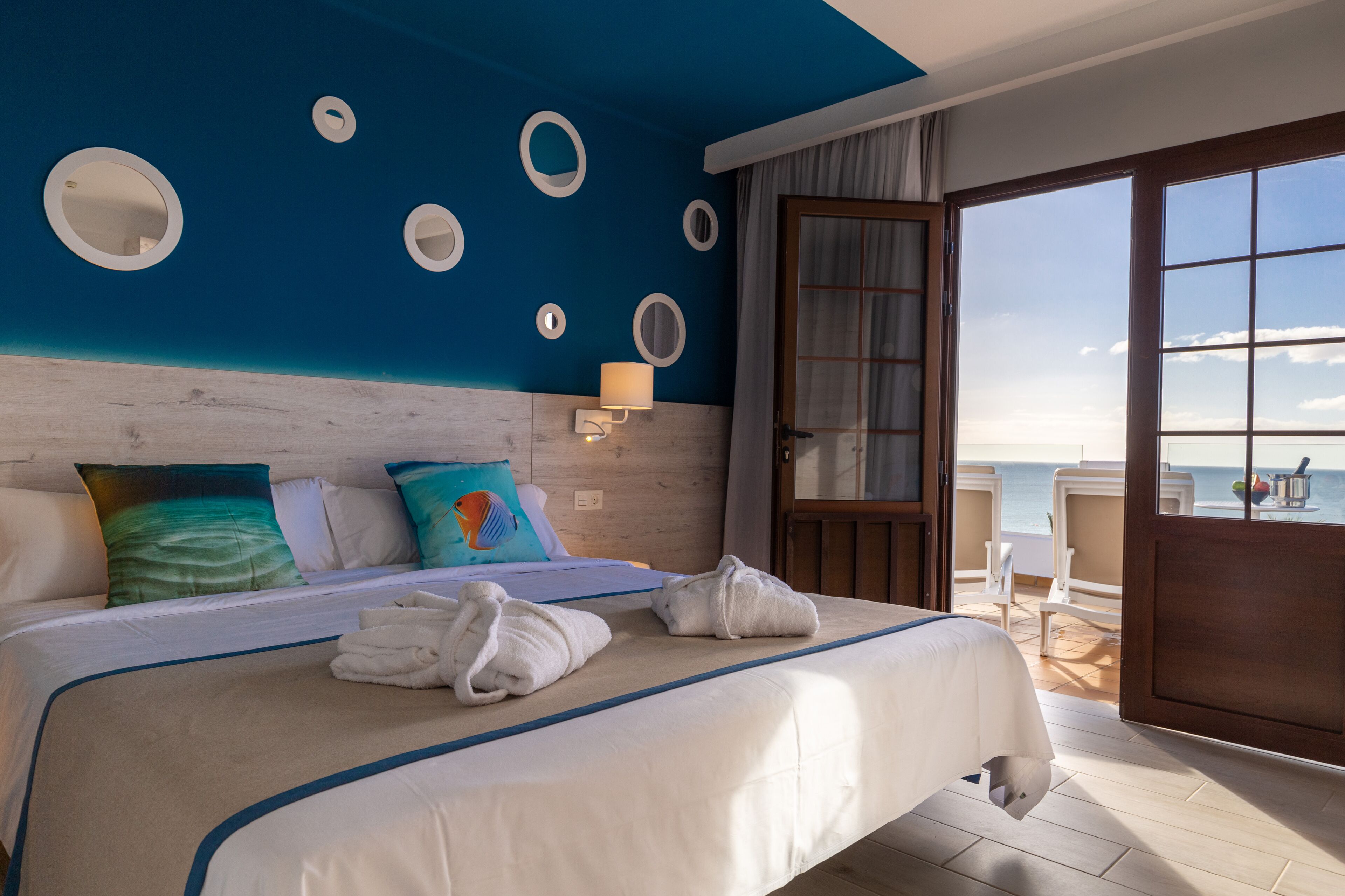 Blackout drapes, cribs (free), WiFi (surcharge), bed sheets