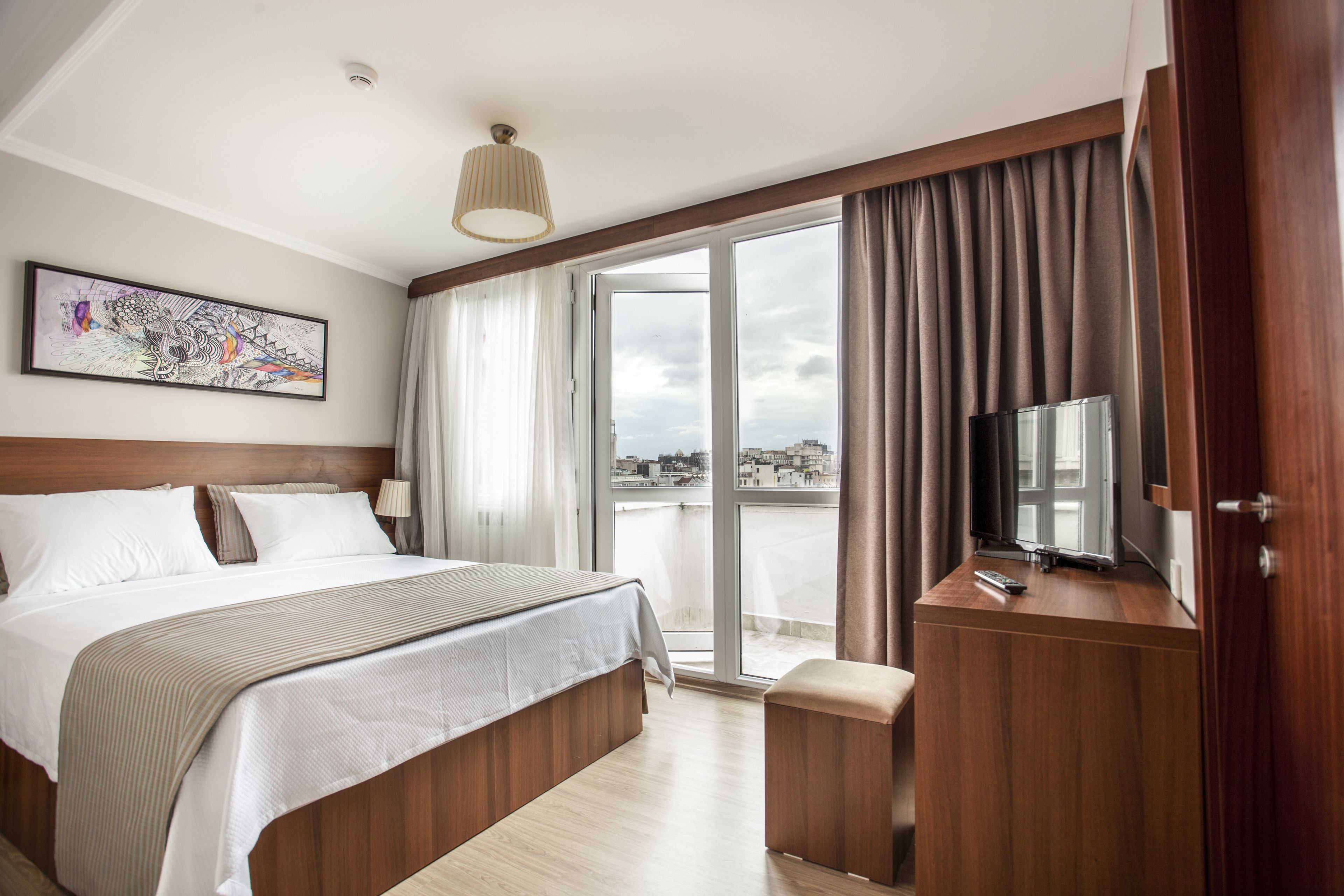 Deluxe Double Room, City View | Hypo-allergenic bedding, minibar, in-room safe, desk