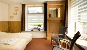 Desk, blackout curtains, free WiFi, bed sheets