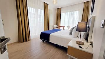 Suite familiar, 2 habitaciones | Ropa de cama de alta calidad, camas Tempur-Pedic y minibar