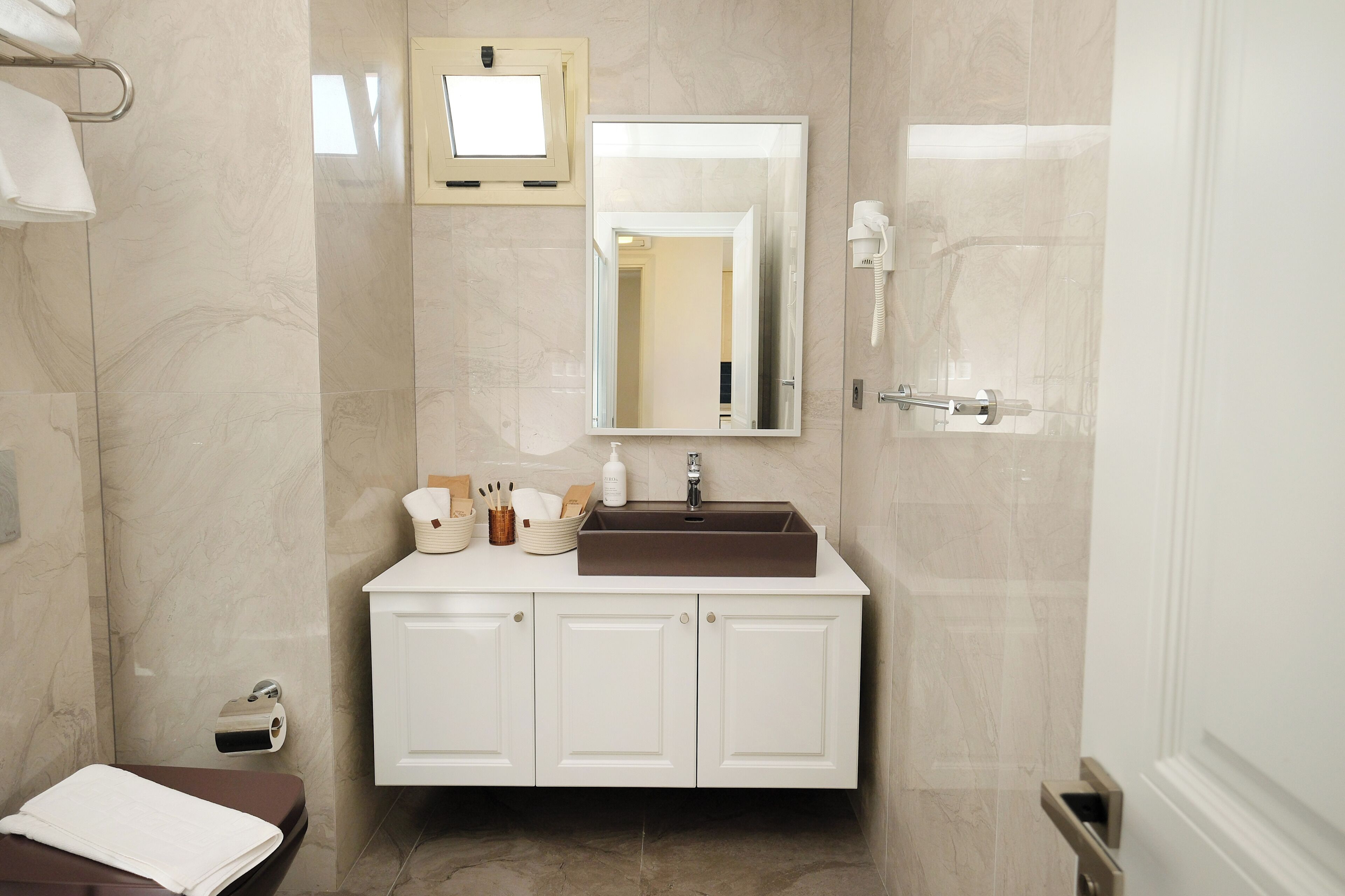 Shower, hydromassage showerhead, designer toiletries, hair dryer