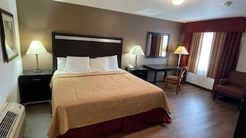 Habitación Deluxe, 1 cama Queen size | Escritorio, wifi gratis y ropa de cama