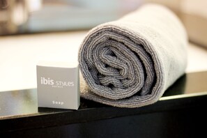 Shower, eco-friendly toiletries, hair dryer, slippers