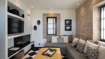 Villa, Sea View (Passava) | Living area | 42-inch Smart TV with digital channels, fireplace, DVD player