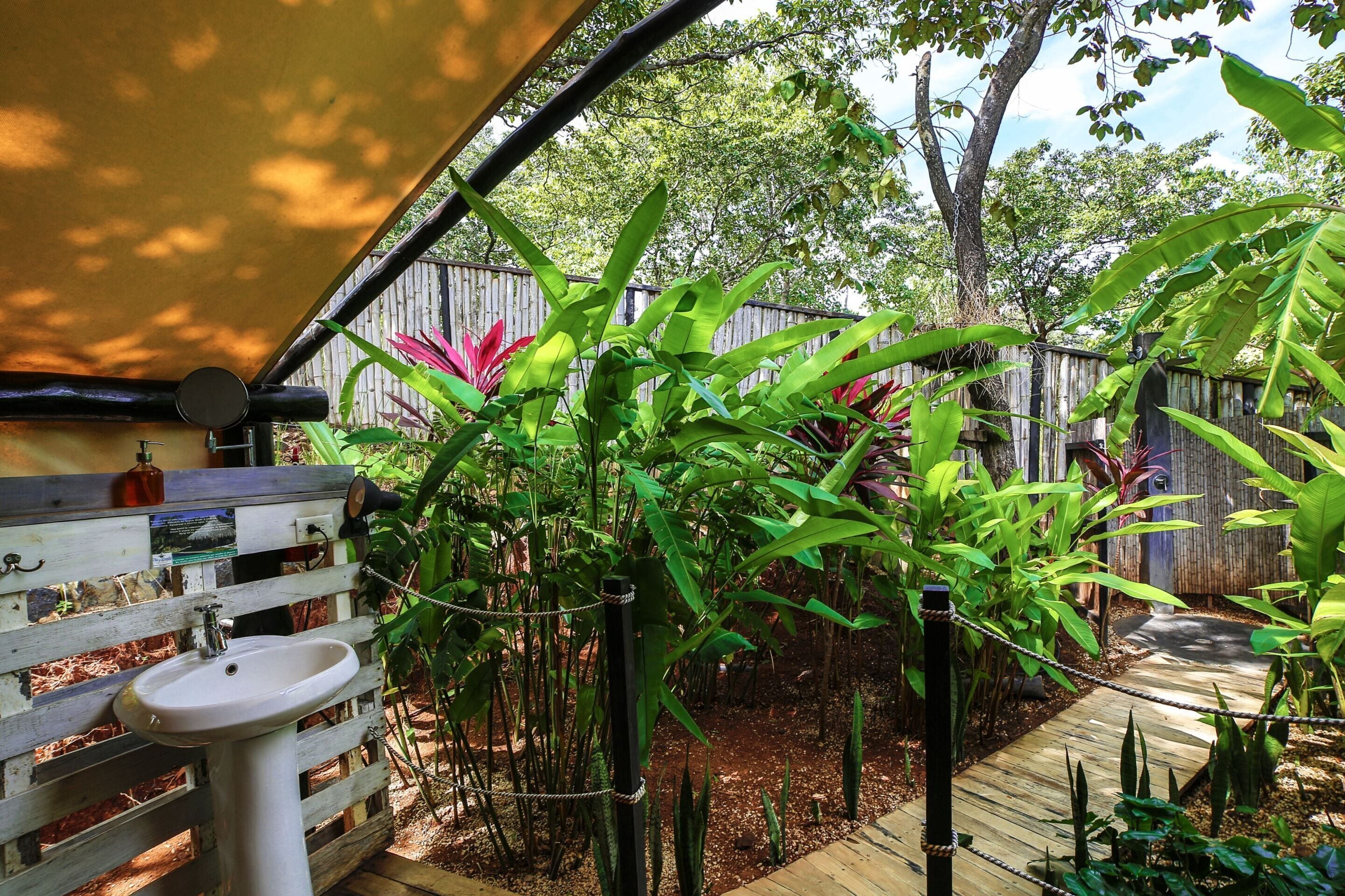 Deluxe Quadruple Room, Accessible, Private Bathroom | Bathroom | Shower, free toiletries, towels