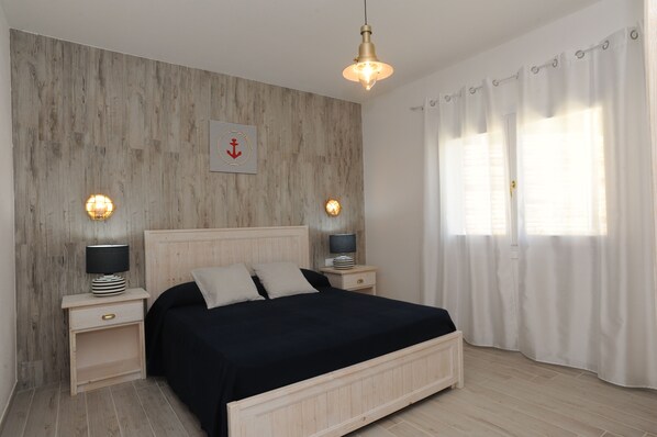 Apartment, 3 Bedrooms (Quadrilocale Mariniere) | 2 bedrooms, down comforters, individually decorated - SardegnaSummer Li Mori (Budoni)
