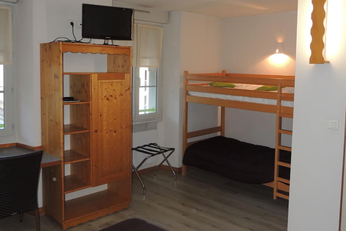 Quadruple Room | Premium bedding, in-room safe, desk, soundproofing