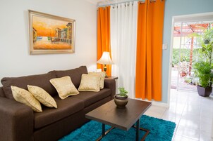 Deluxe Apartment, 2 Bedrooms, Mountain View, Executive Level | Living room | 50-inch flat-screen TV with cable channels, TV, DVD player