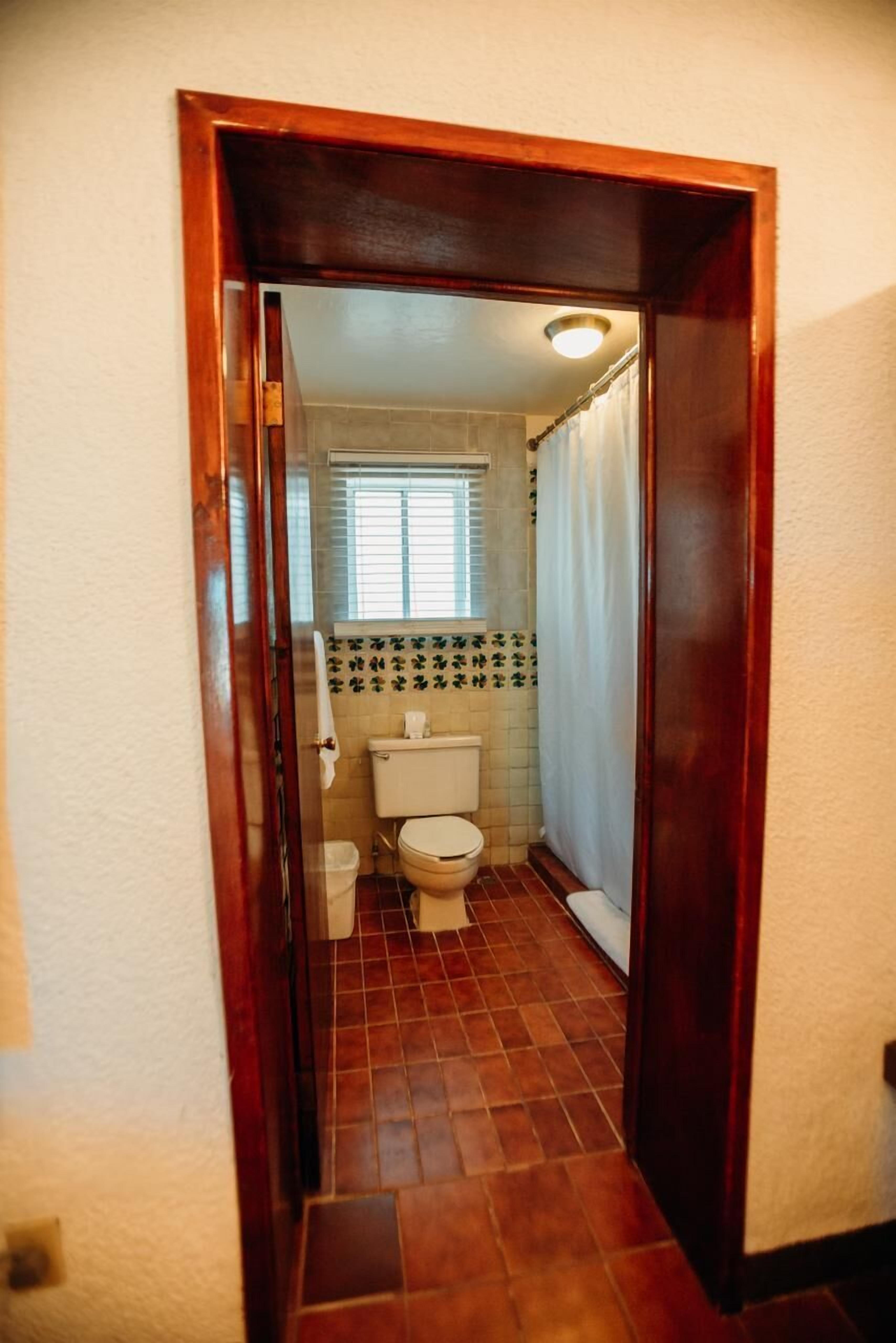 superior double room single use, 2 double beds, courtyard view | bathroom | free toiletries, hair dryer, towels, soap