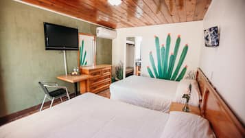 Habitación doble estándar, 1 habitación, vista parcial al océano | Ropa de cama de alta calidad, edredón y cortinas blackout