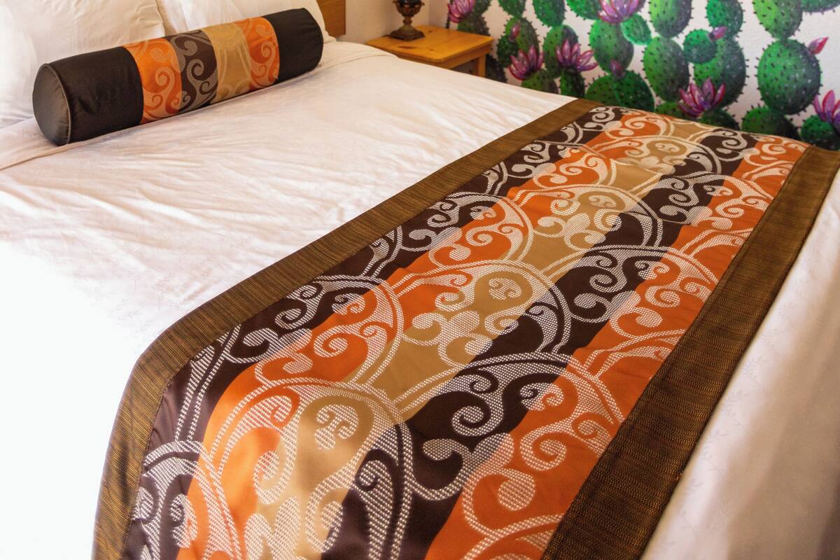 Basic Room | Premium bedding, down comforters, blackout drapes