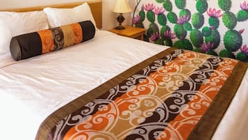 Premium bedding, down duvets, blackout curtains, iron/ironing board