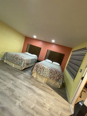 Standard Room, 2 Queen Beds, Non Smoking | Rollaway beds, free WiFi, bed sheets