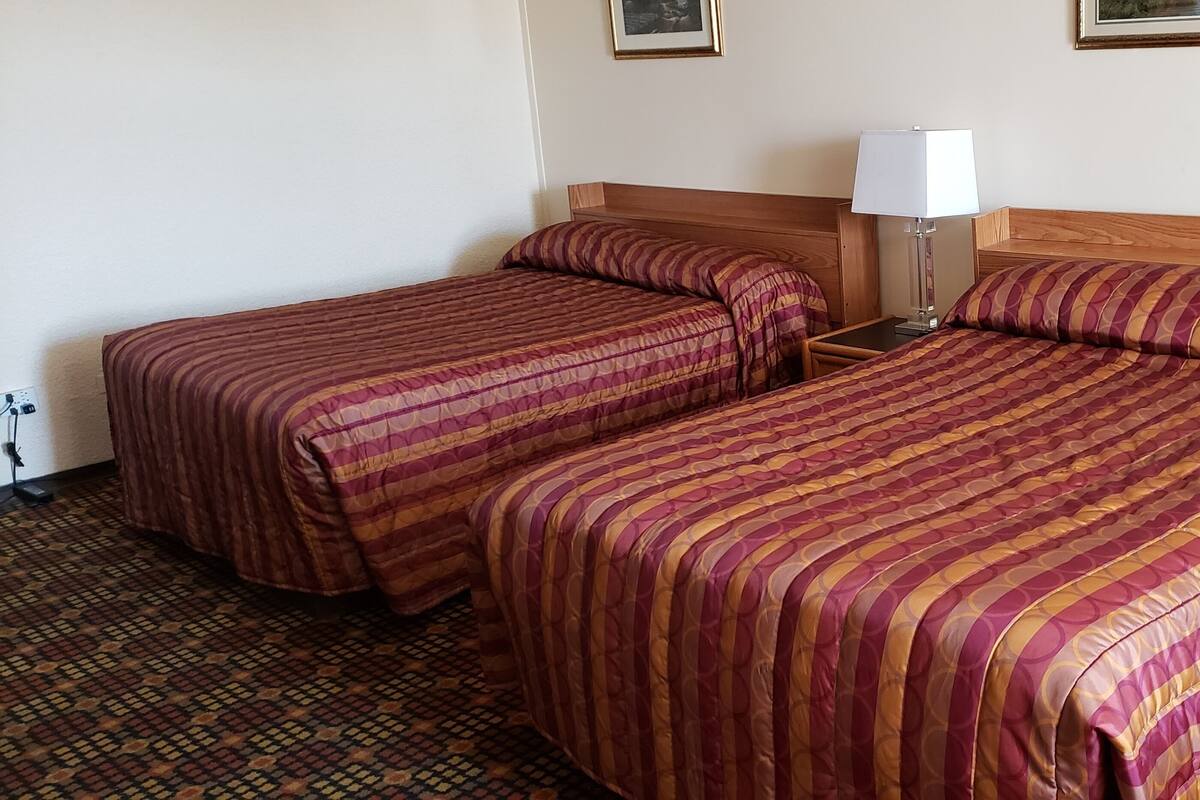 Standard Room, 2 Double Beds | WiFi (free), bed sheets