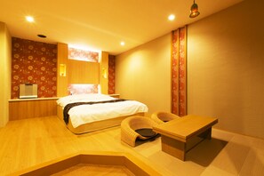 Junior Suite Room | Living area | Flat-screen TV, DVD player