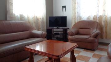 Standard Apartment, 3 Bedrooms, Kitchen (Dominique Apartment) | Living room | 40-inch flat-screen TV with satellite channels, TV
