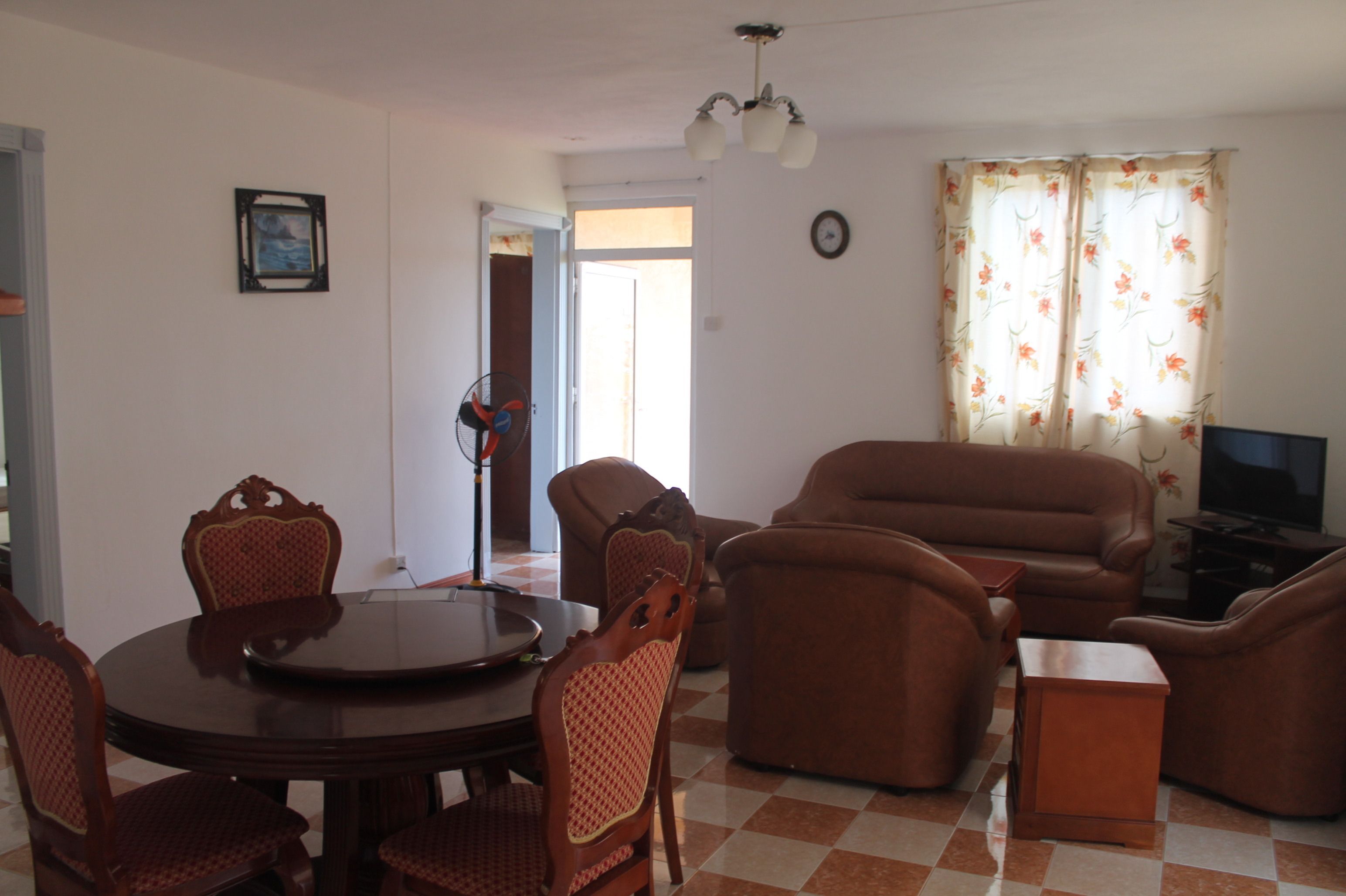 40-inch flat-screen TV with satellite channels, TV