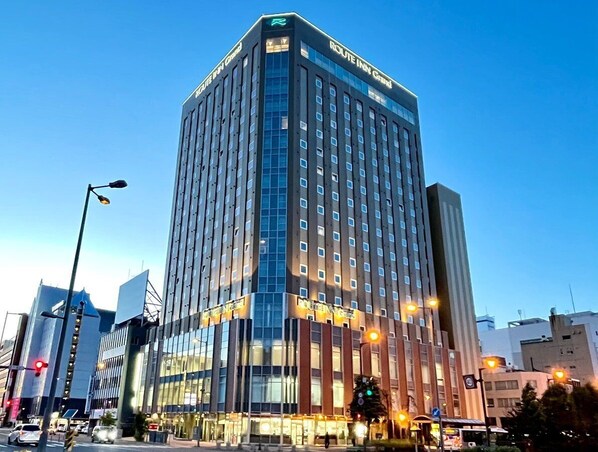 Standing tall in the heart of the city, the Route Inn Grand offers a sleek, modern exterior.