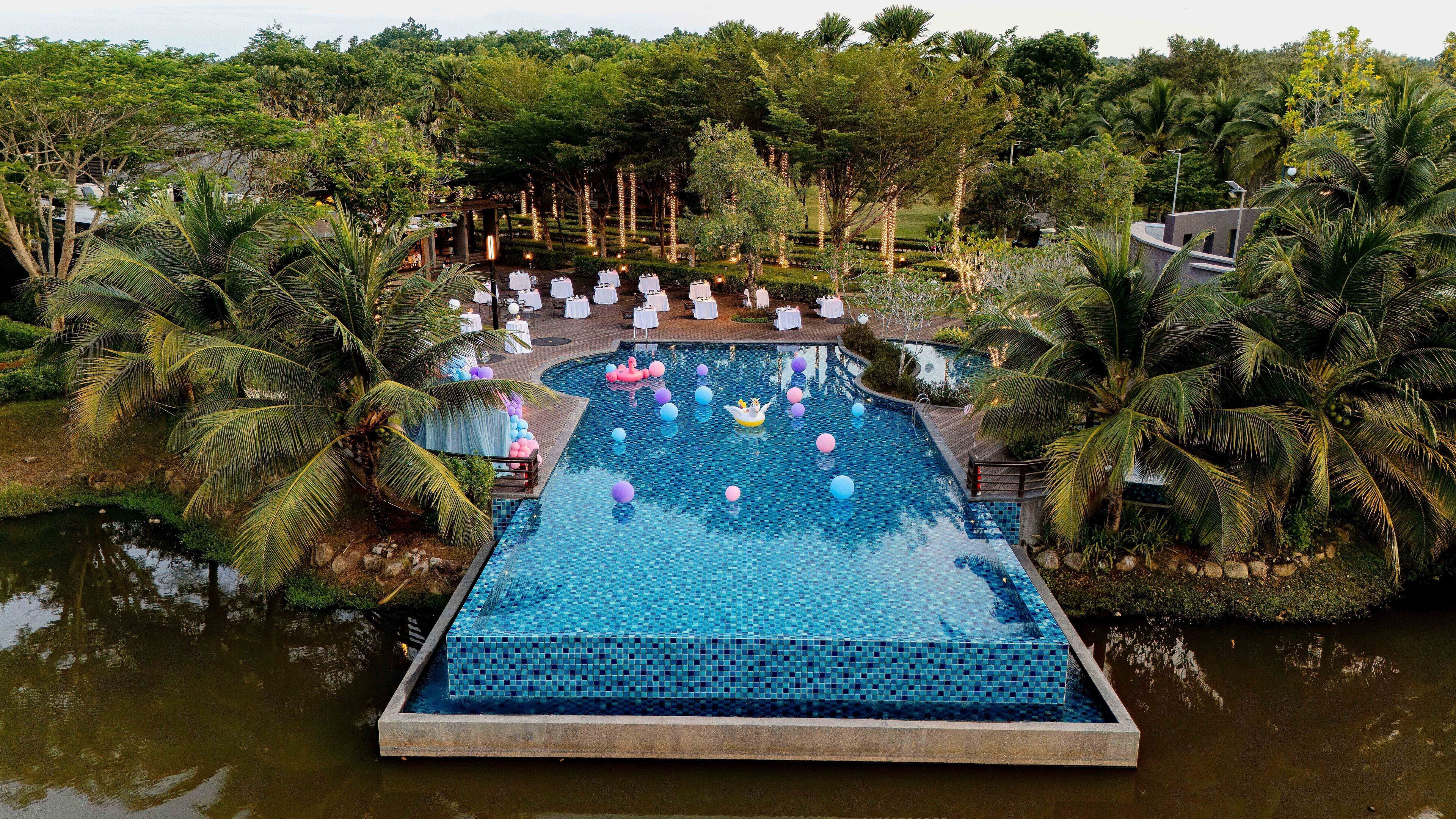 outdoor pool, pool umbrellas, pool loungers