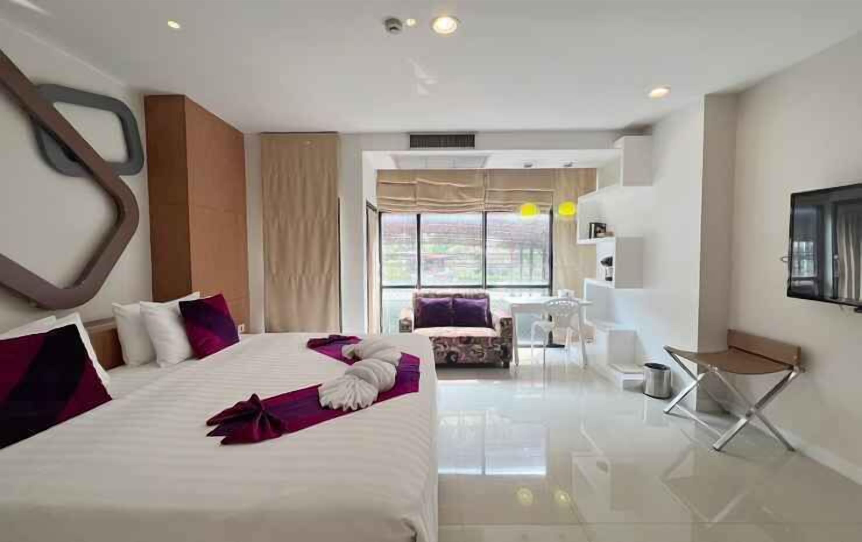 Roupas de cama premium, frigobar (abastecido com alguns itens grátis)