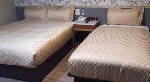 Habitación Business con 2 camas individuales, 2 camas individuales | Cunas o camas infantiles gratuitas y wifi gratis