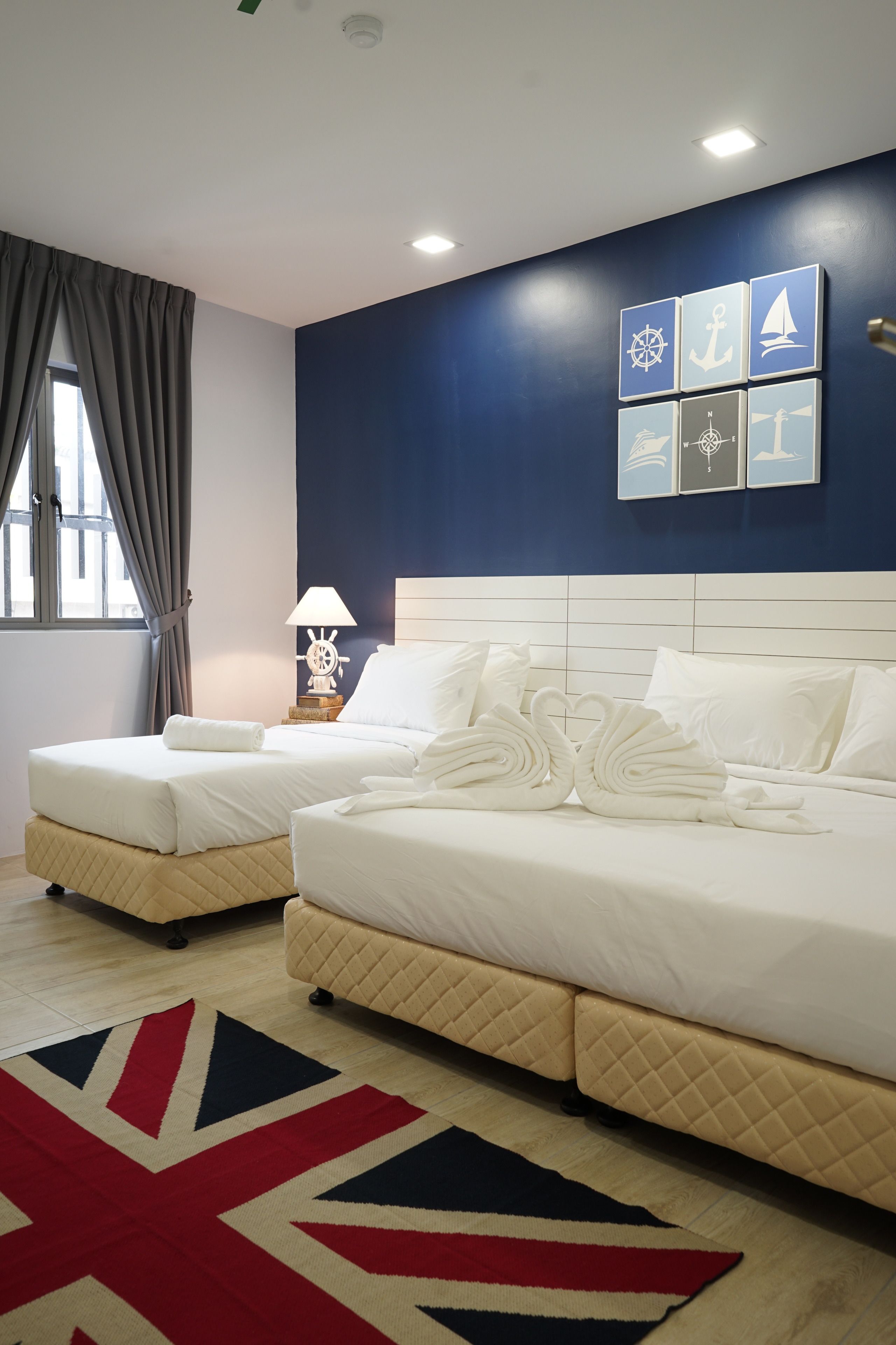 family room | desk, blackout curtains, soundproofing, iron/ironing board