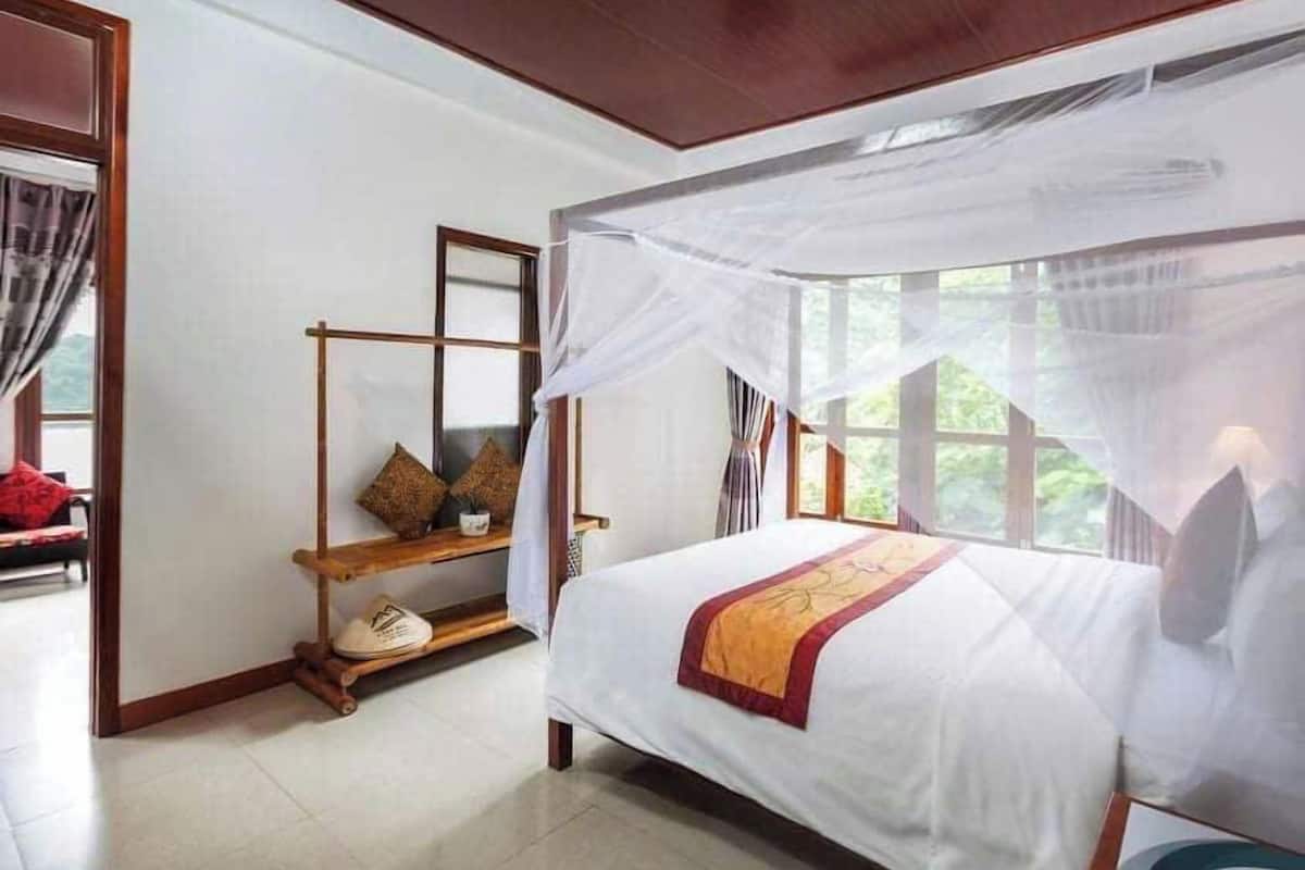 Suite familiale, vue sur le lac | Articles de minibar gratuits, coffre-fort, bureau