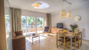 32-inch flat-screen TV with satellite channels, TV