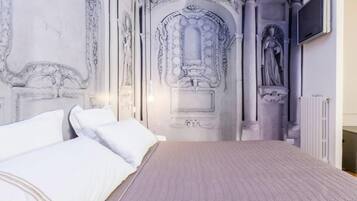 Studio | Egyptian cotton sheets, pillow-top beds, desk, iron/ironing board